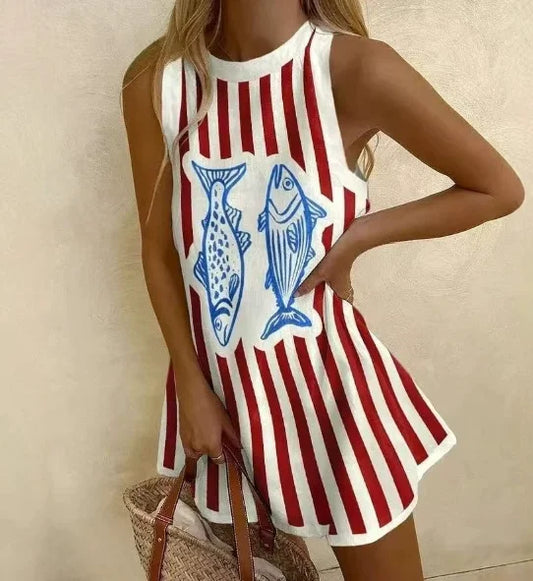 Woman wearing a red and white striped dress with blue fish design on a beige background
