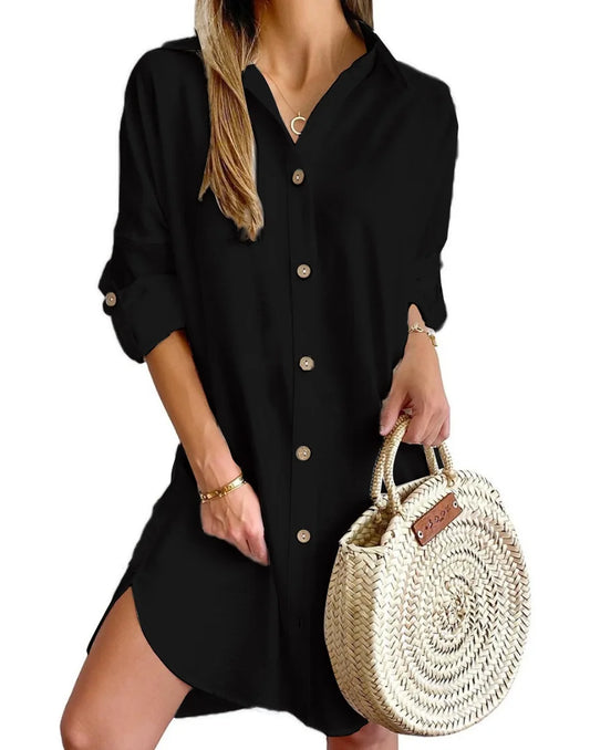 Woman wearing a black dress holding a woven handbag on a white background