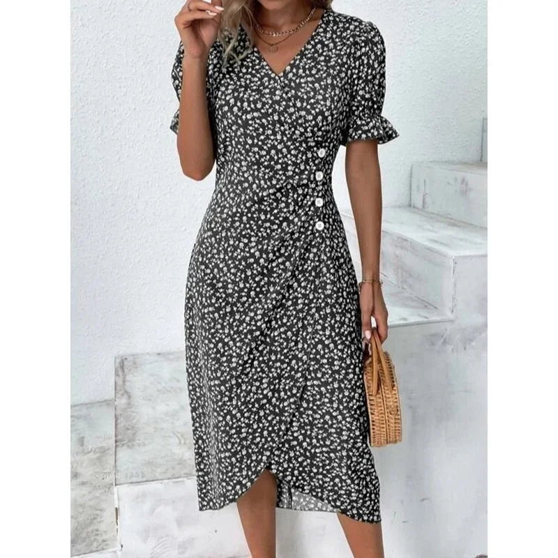 Robe midi plissée à fleurs élégante avec manches bouffantes et taille froncée