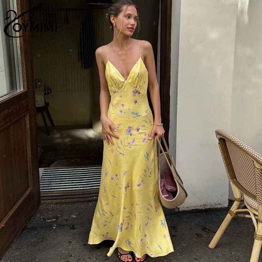 Vestido casual amarillo con tirantes finos y estampado de Oymimi, largo hasta los tobillos y espalda abierta