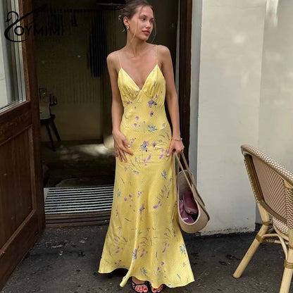 Vestido casual amarillo con tirantes finos y estampado de Oymimi, largo hasta los tobillos y espalda abierta