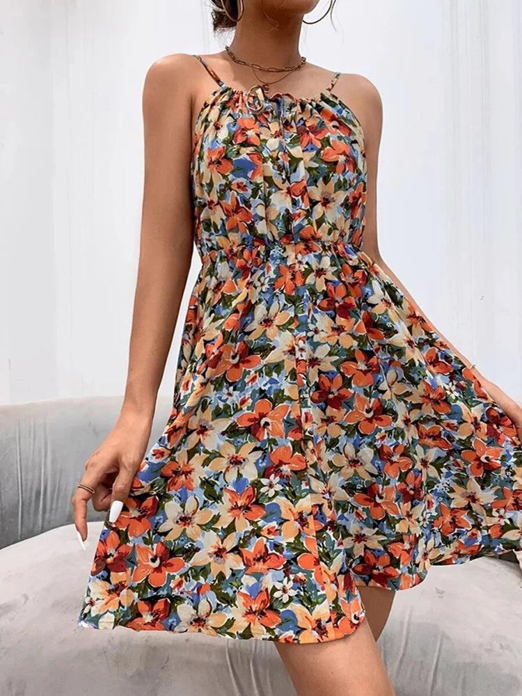 Multicolored floral dress worn by a person on a neutral background