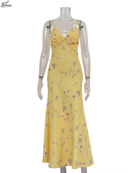 Vestido casual amarillo con tirantes finos y estampado de Oymimi, largo hasta los tobillos y espalda abierta