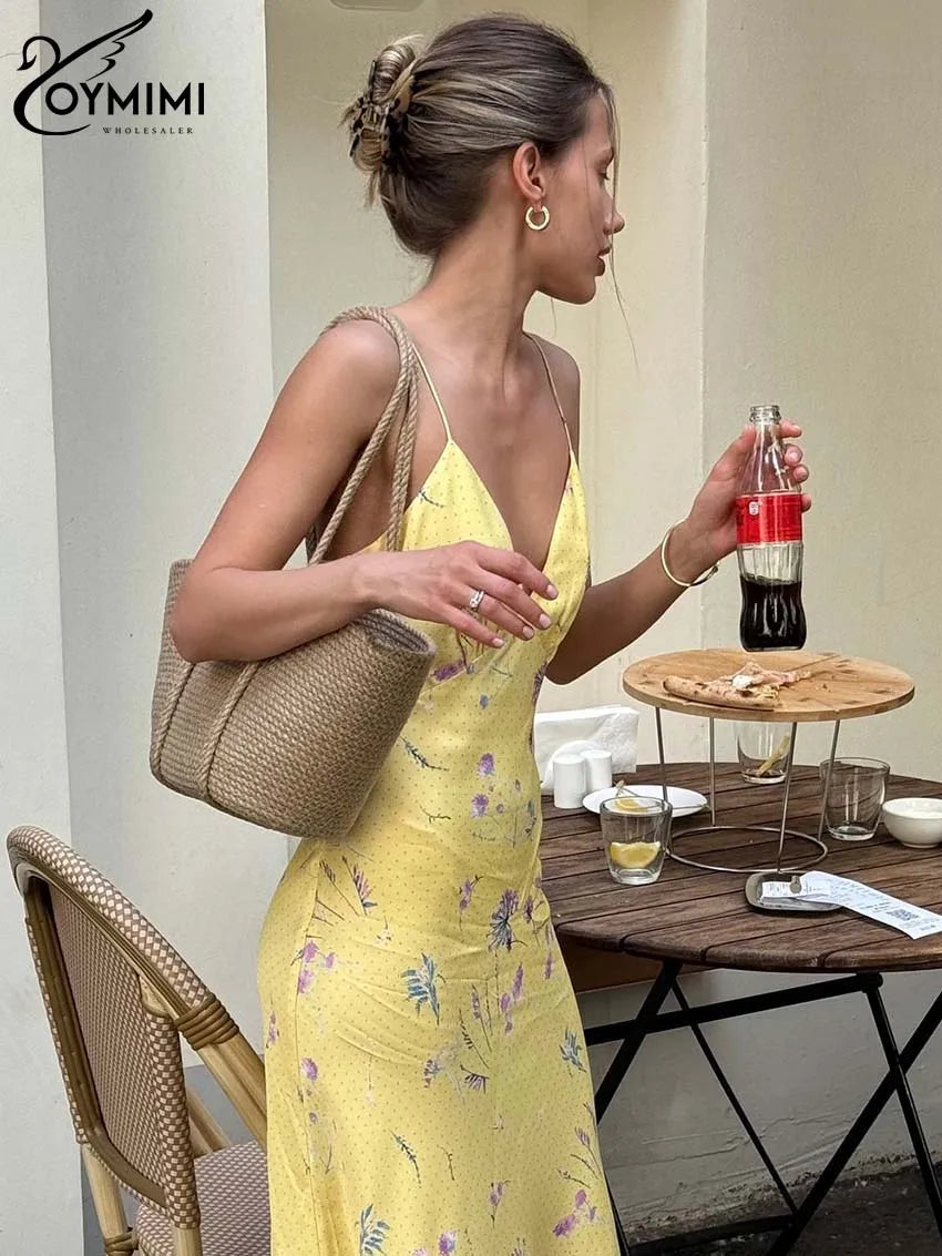 Vestido casual amarillo con tirantes finos y estampado de Oymimi, largo hasta los tobillos y espalda abierta