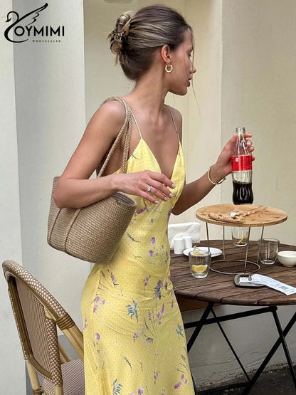 Vestido casual amarillo con tirantes finos y estampado de Oymimi, largo hasta los tobillos y espalda abierta
