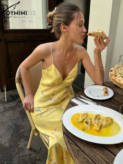 Vestido casual amarillo con tirantes finos y estampado de Oymimi, largo hasta los tobillos y espalda abierta