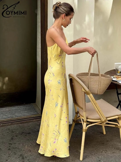 Vestido casual amarillo con tirantes finos y estampado de Oymimi, largo hasta los tobillos y espalda abierta
