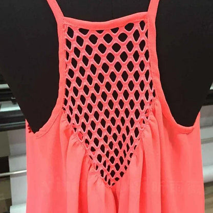 Vestido mini informal holgado de verano, sin mangas, con tirantes finos y aberturas.